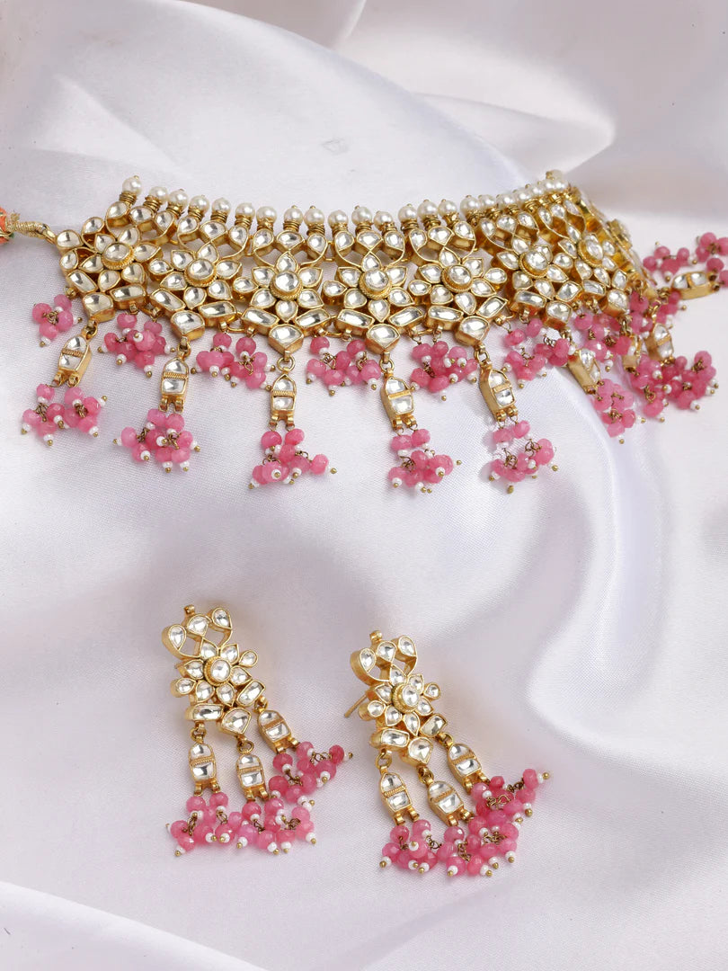 Ritwika Kundan Pink Drop Necklace with Earrings in Dull Gold Finish