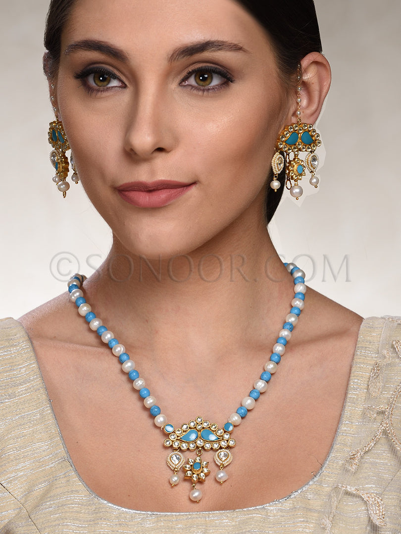 Niyathi Kundan Pearl Turquoise Pendant Set